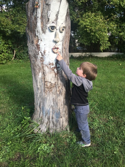 Colt age 3 with same tree on the day they moved to their new home